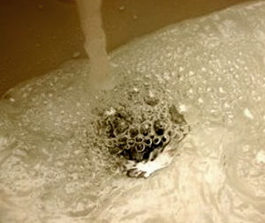 Clogged bathroom sink in Northern VA home draining very slowly.