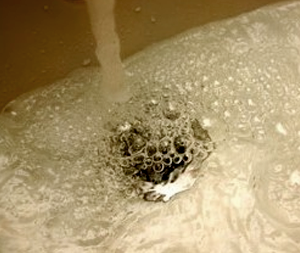 Clogged bathroom sink in Washington, DC home draining very slowly.