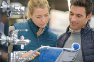 Couple choosing new plumbing fixtures